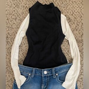 Black Sleeveless Ribbed Turtleneck Tank Top